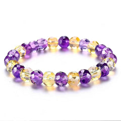 Purple and Yellow Faceted Bead Bracelet on White Background